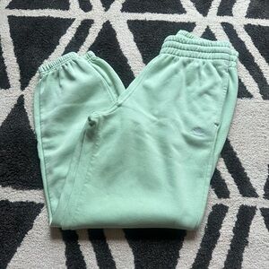 Light green Adidas sweatpants